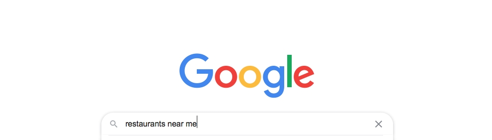 screenshot of a Google search that reads, "restaurants near me"